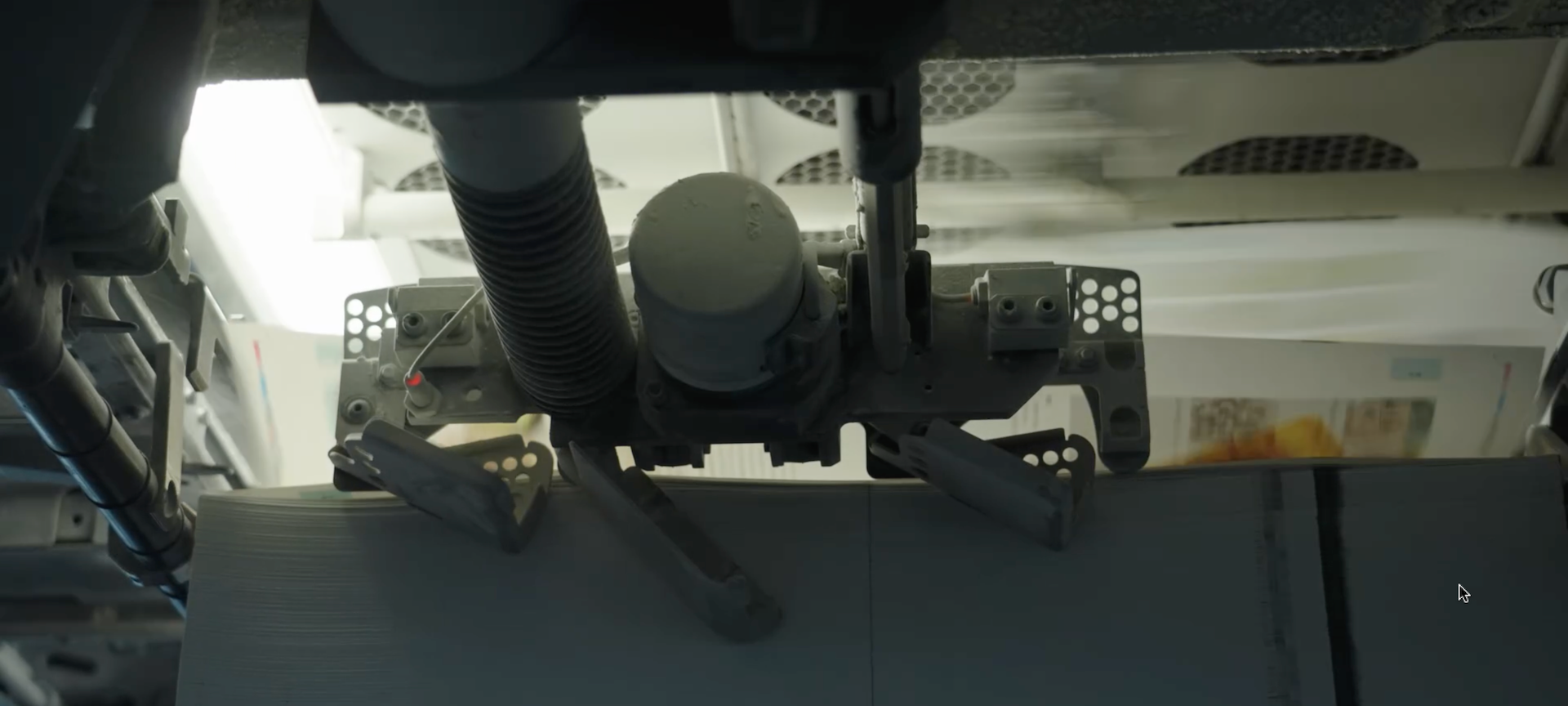 High-speed offset printing in progress at the Inclpress facility, showing sheets rapidly moving through a Heidelberg press for fast global turnaround